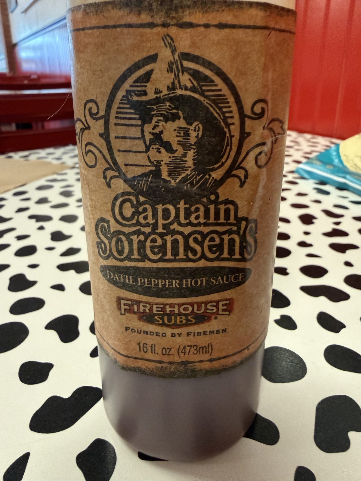 "Founded by Firemen" isn't a slogan tacked on — it's printed on the sauce bottle itself.